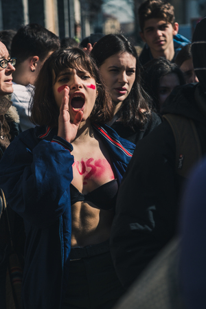 MILAN, ITALY - MARCH 8: Secondary school students take part in a march to celebrate the International Wome's Day on MARCH 8, 2018 in Milan.のeditorial素材