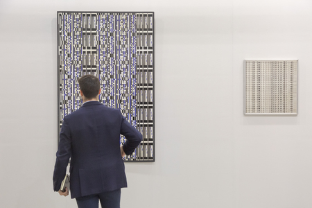 MILAN, ITALY - APRIL 13: People visit Miart, international exhibition of modern and contemporary art on APRIL 13, 2018 in Milan.のeditorial素材