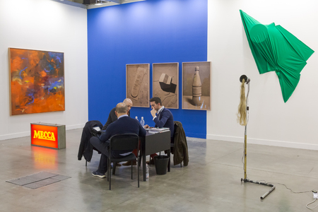 MILAN, ITALY - APRIL 13: Exhibitors are seen in their stand at Miart, international exhibition of modern and contemporary art on APRIL 13, 2018 in Milan.のeditorial素材