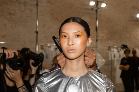 MILAN, ITALY - SEPTEMBER 19: Beautiful model poses in the backstage just before Alberto Zambelli show during Milan Women's Fashion Week on SEPTEMBER 19, 2018 in Milan.のeditorial素材