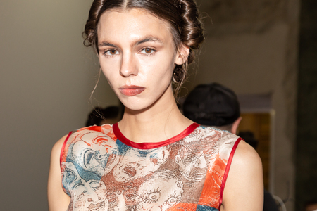 MILAN, ITALY - SEPTEMBER 23: Beautiful model poses in the backstage just before Francesca Liberatore show during Milan Women's Fashion Week on SEPTEMBER 23, 2018 in Milan.のeditorial素材
