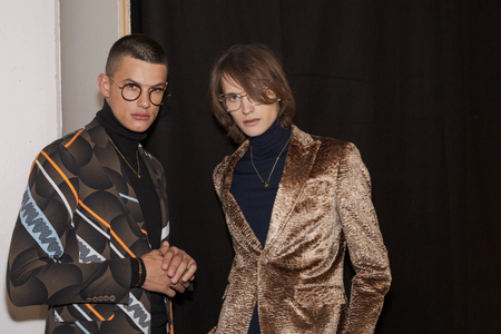 MILAN, ITALY - JANUARY 12: Beautiful models pose in the backstage just before Miguel Vieira show during Milan Men's Fashion Week on JANUARY 12, 2019 in Milan.のeditorial素材