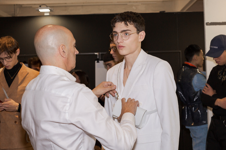 MILAN, ITALY - JANUARY 12: Beautiful model poses in the backstage just before Miguel Vieira show during Milan Men's Fashion Week on JANUARY 12, 2019 in Milan.のeditorial素材