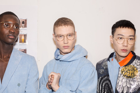 MILAN, ITALY - JANUARY 12: Beautiful models pose in the backstage just before Miguel Vieira show during Milan Men's Fashion Week on JANUARY 12, 2019 in Milan.のeditorial素材
