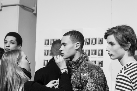 MILAN, ITALY - JANUARY 12: Beautiful models pose in the backstage just before Miguel Vieira show during Milan Men's Fashion Week on JANUARY 12, 2019 in Milan.のeditorial素材