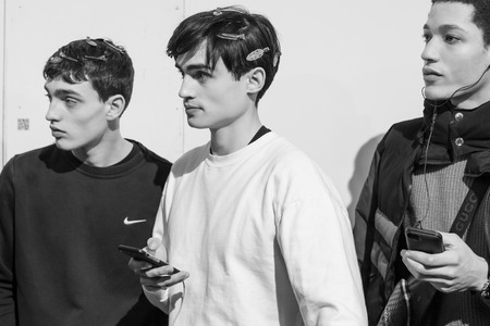 MILAN, ITALY - JANUARY 12: Beautiful models pose in the backstage just before Miguel Vieira show during Milan Men's Fashion Week on JANUARY 12, 2019 in Milan.のeditorial素材