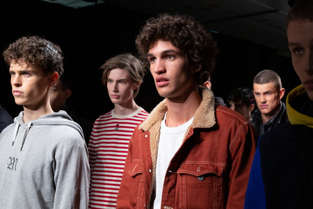 MILAN, ITALY - JANUARY 12: Models are seen at rehearsal just before Miguel Vieira show during Milan Men's Fashion Week on JANUARY 12, 2019 in Milan.のeditorial素材