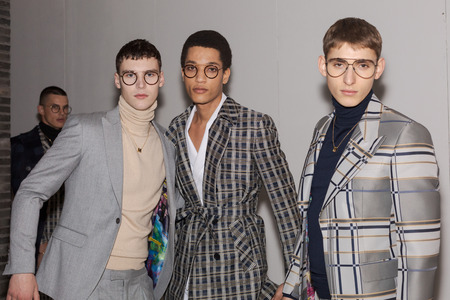 MILAN, ITALY - JANUARY 12: Beautiful models pose in the backstage just before Miguel Vieira show during Milan Men's Fashion Week on JANUARY 12, 2019 in Milan.のeditorial素材
