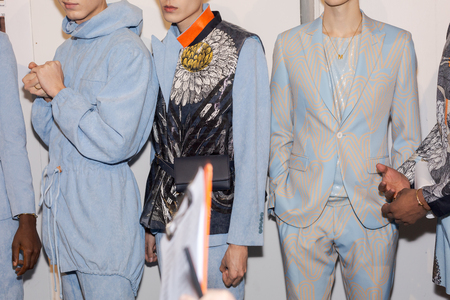MILAN, ITALY - JANUARY 12: Beautiful models pose in the backstage just before Miguel Vieira show during Milan Men's Fashion Week on JANUARY 12, 2019 in Milan.のeditorial素材