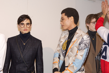 MILAN, ITALY - JANUARY 12: Beautiful models pose in the backstage just before Miguel Vieira show during Milan Men's Fashion Week on JANUARY 12, 2019 in Milan.のeditorial素材