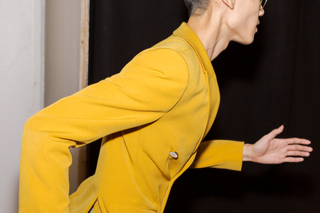 MILAN, ITALY - JANUARY 12: Beautiful model runs in the backstage just before Miguel Vieira show during Milan Men's Fashion Week on JANUARY 12, 2019 in Milan.のeditorial素材