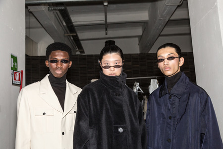 MILAN, ITALY - JANUARY 13: Beautiful models pose in the backstage just before Miaoran show during Milan Men's Fashion Week on JANUARY 13, 2019 in Milan.のeditorial素材