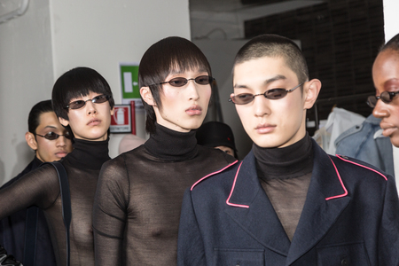 MILAN, ITALY - JANUARY 13: Beautiful models pose in the backstage just before Miaoran show during Milan Men's Fashion Week on JANUARY 13, 2019 in Milan.のeditorial素材