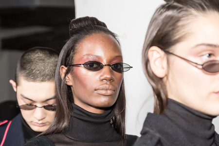 MILAN, ITALY - JANUARY 13: Beautiful models pose in the backstage just before Miaoran show during Milan Men's Fashion Week on JANUARY 13, 2019 in Milan.のeditorial素材