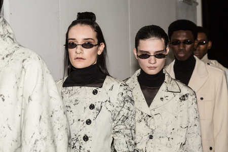 MILAN, ITALY - JANUARY 13: Beautiful models pose in the backstage just before Miaoran show during Milan Men's Fashion Week on JANUARY 13, 2019 in Milan.のeditorial素材