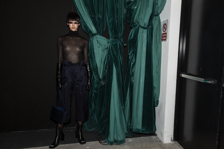 MILAN, ITALY - JANUARY 13: Beautiful model poses in the backstage just before Miaoran show during Milan Men's Fashion Week on JANUARY 13, 2019 in Milan.のeditorial素材