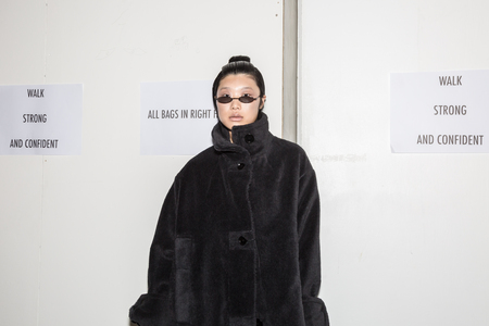 MILAN, ITALY - JANUARY 13: Beautiful model poses in the backstage just before Miaoran show during Milan Men's Fashion Week on JANUARY 13, 2019 in Milan.のeditorial素材