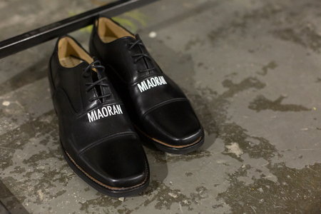 MILAN, ITALY - JANUARY 13: Detail of shoes in the backstage just before Miaoran show during Milan Men's Fashion Week on JANUARY 13, 2019 in Milan.のeditorial素材