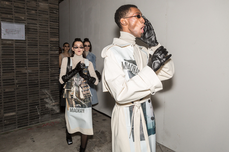 MILAN, ITALY - JANUARY 13: Beautiful models pose in the backstage just before Miaoran show during Milan Men's Fashion Week on JANUARY 13, 2019 in Milan.のeditorial素材