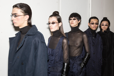 MILAN, ITALY - JANUARY 13: Beautiful models pose in the backstage just before Miaoran show during Milan Men's Fashion Week on JANUARY 13, 2019 in Milan.のeditorial素材