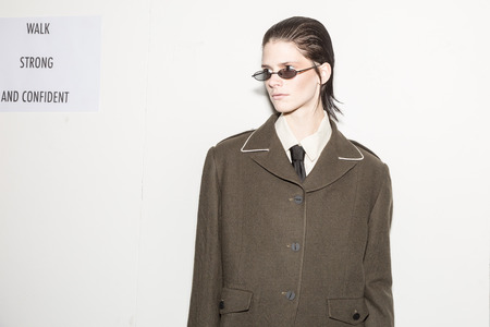 MILAN, ITALY - JANUARY 13: Beautiful model poses in the backstage just before Miaoran show during Milan Men's Fashion Week on JANUARY 13, 2019 in Milan.のeditorial素材