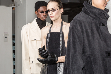 MILAN, ITALY - JANUARY 13: Beautiful models pose in the backstage just before Miaoran show during Milan Men's Fashion Week on JANUARY 13, 2019 in Milan.のeditorial素材