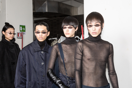MILAN, ITALY - JANUARY 13: Beautiful models pose in the backstage just before Miaoran show during Milan Men's Fashion Week on JANUARY 13, 2019 in Milan.のeditorial素材
