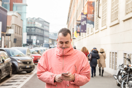 MILAN, ITALY - JANUARY 12: Fashionable man poses outside Magliano fashion show during Milan Men's Fashion Week on JANUARY 12, 2019 in Milan.のeditorial素材