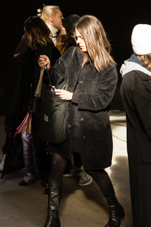 MILAN, ITALY - JANUARY 12: Fashionable woman poses outside Magliano fashion show during Milan Men's Fashion Week on JANUARY 12, 2019 in Milan.のeditorial素材