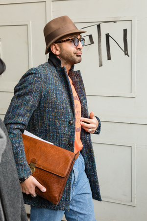 MILAN, ITALY - JANUARY 12: Fashionable man poses outside Magliano fashion show during Milan Men's Fashion Week on JANUARY 12, 2019 in Milan.のeditorial素材