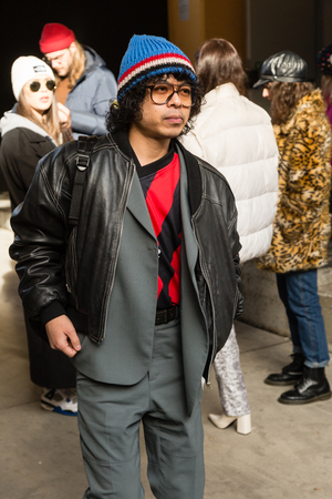 MILAN, ITALY - JANUARY 12: Fashionable man poses outside Magliano fashion show during Milan Men's Fashion Week on JANUARY 12, 2019 in Milan.のeditorial素材