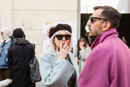 MILAN, ITALY - JANUARY 12: Fashionable people pose outside Magliano fashion show during Milan Men's Fashion Week on JANUARY 12, 2019 in Milan.のeditorial素材