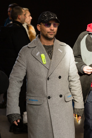 MILAN, ITALY - JANUARY 12: Fashionable man poses outside Magliano fashion show during Milan Men's Fashion Week on JANUARY 12, 2019 in Milan.のeditorial素材