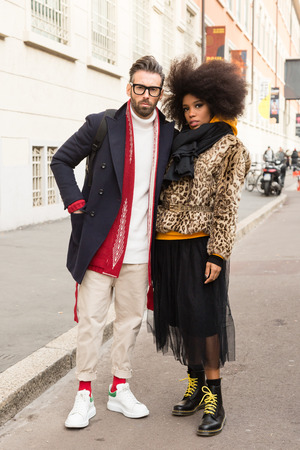 MILAN, ITALY - JANUARY 12: Fashionable couple poses outside Magliano fashion show during Milan Men's Fashion Week on JANUARY 12, 2019 in Milan.のeditorial素材