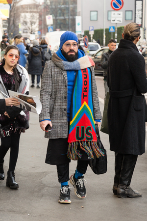 MILAN, ITALY - JANUARY 12: Fashionable man poses outside Magliano fashion show during Milan Men's Fashion Week on JANUARY 12, 2019 in Milan.のeditorial素材