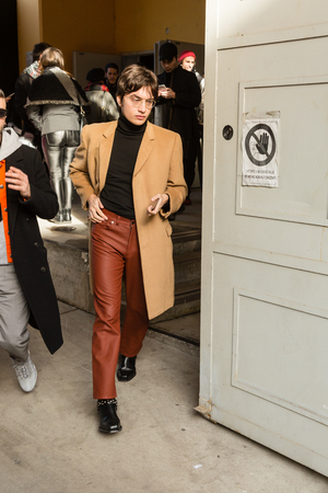 MILAN, ITALY - JANUARY 12: Fashionable man poses outside Magliano fashion show during Milan Men's Fashion Week on JANUARY 12, 2019 in Milan.のeditorial素材