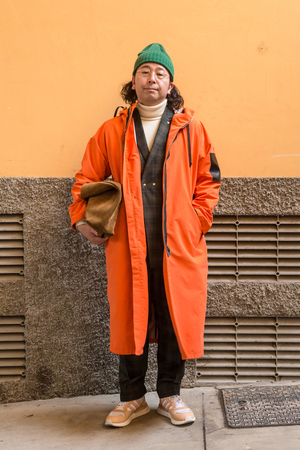 MILAN, ITALY - JANUARY 12: Fashionable man poses outside Magliano fashion show during Milan Men's Fashion Week on JANUARY 12, 2019 in Milan.のeditorial素材