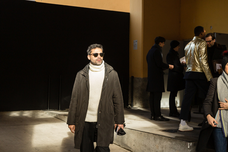 MILAN, ITALY - JANUARY 12: Fashionable man poses outside Magliano fashion show during Milan Men's Fashion Week on JANUARY 12, 2019 in Milan.のeditorial素材