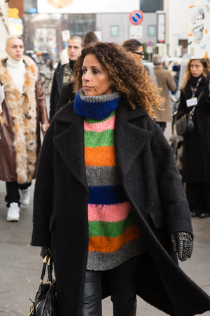 MILAN, ITALY - JANUARY 12: Fashionable woman poses outside Magliano fashion show during Milan Men's Fashion Week on JANUARY 12, 2019 in Milan.のeditorial素材