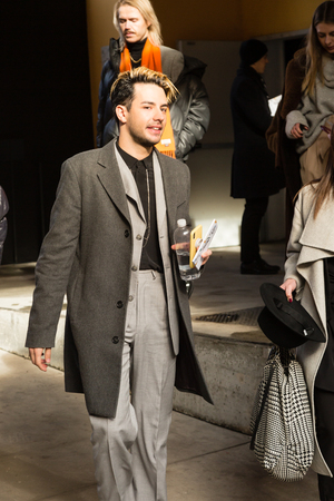 MILAN, ITALY - JANUARY 12: Fashionable man poses outside Magliano fashion show during Milan Men's Fashion Week on JANUARY 12, 2019 in Milan.のeditorial素材