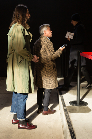 MILAN, ITALY - JANUARY 12: Fashionable people pose outside Magliano fashion show during Milan Men's Fashion Week on JANUARY 12, 2019 in Milan.のeditorial素材