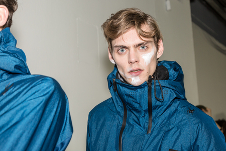MILAN, ITALY - JANUARY 14: Beautiful model poses in the backstage just before Spyder show during Milan Men's Fashion Week on JANUARY 14, 2019 in Milan.のeditorial素材