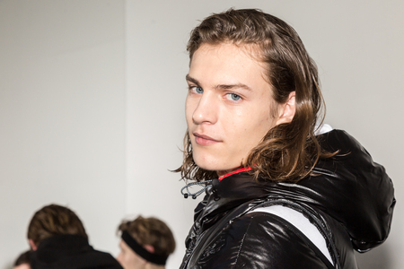 MILAN, ITALY - JANUARY 14: Beautiful model poses in the backstage just before Spyder show during Milan Men's Fashion Week on JANUARY 14, 2019 in Milan.のeditorial素材