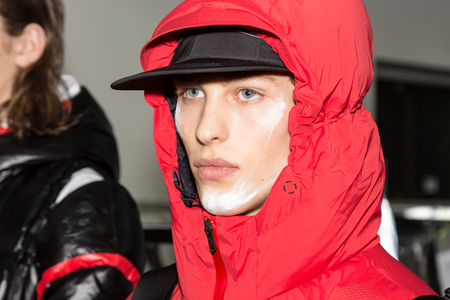 MILAN, ITALY - JANUARY 14: Beautiful model poses in the backstage just before Spyder show during Milan Men's Fashion Week on JANUARY 14, 2019 in Milan.のeditorial素材