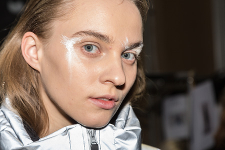 MILAN, ITALY - JANUARY 14: Beautiful model poses in the backstage just before Spyder show during Milan Men's Fashion Week on JANUARY 14, 2019 in Milan.のeditorial素材
