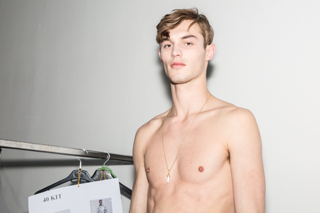 MILAN, ITALY - JANUARY 14: Beautiful model poses in the backstage just before Spyder show during Milan Men's Fashion Week on JANUARY 14, 2019 in Milan.のeditorial素材