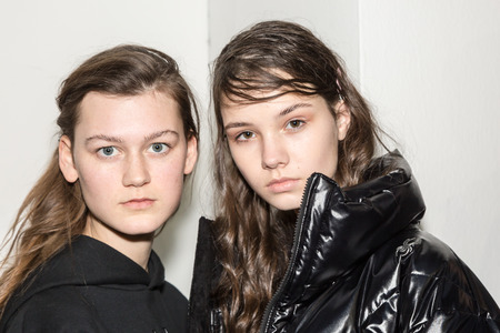 MILAN, ITALY - JANUARY 14: Beautiful models pose in the backstage just before Spyder show during Milan Men's Fashion Week on JANUARY 14, 2019 in Milan.のeditorial素材
