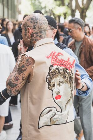 MILAN, ITALY - JUNE 15: Fashionable man poses outside Armani fashion show during Milan Men's Fashion Week on JUNE 15, 2019 in Milan.のeditorial素材