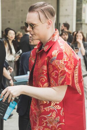 MILAN, ITALY - JUNE 15: Fashionable man poses outside Armani fashion show during Milan Men's Fashion Week on JUNE 15, 2019 in Milan.のeditorial素材