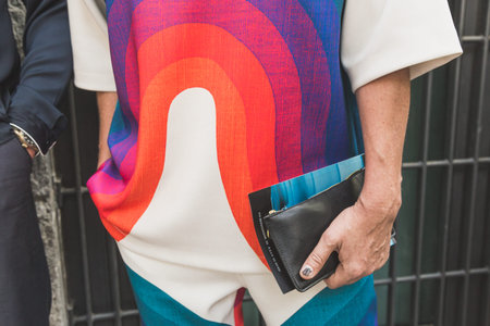 MILAN, ITALY - JUNE 15: Detail of bag outside Armani fashion show during Milan Men's Fashion Week on...